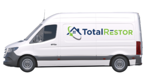 TotalRestor, a local restoration company white van arriving for restoration service.